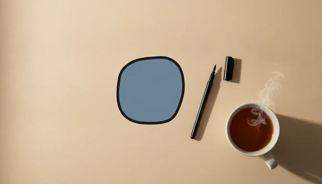 Calm minimalist still life on a warm cream background: a single bold rounded black — what to do when overstimulated