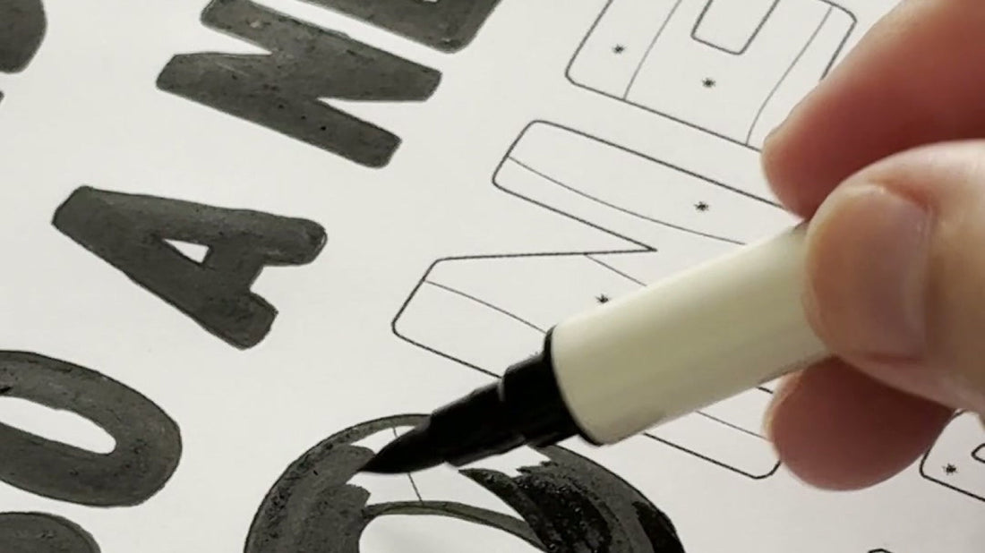Filling a bold letter with the brush pen — one color coloring close-up